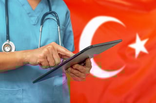 Surgeon or doctor using a digital tablet