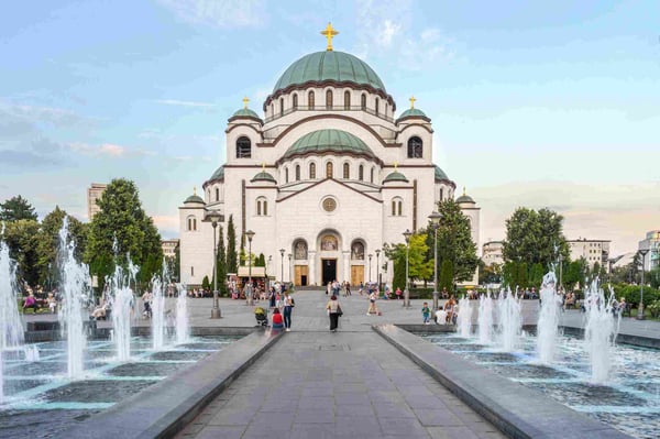 View on square with fountains and Saint Sava cathedral