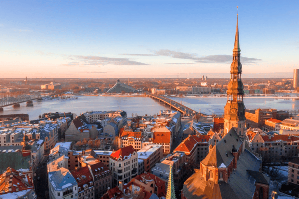 aerial winter view over riga old town with dome cathedral and river daugava during sunset amazing latvia