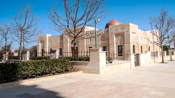 al husseini mosque in amman the capital of jordan on a sunny day two slender minarets mark the