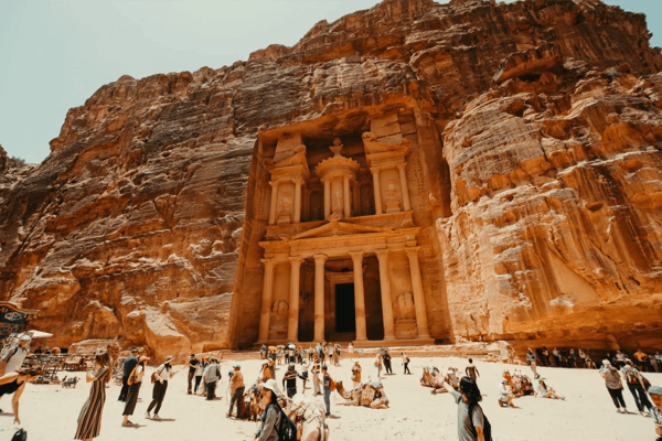 ancient city of petra with tourists and locals jordan 