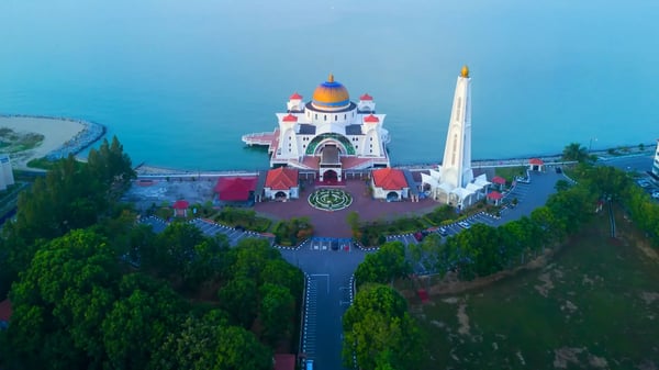 arial view of malacca straits mosque during sunset