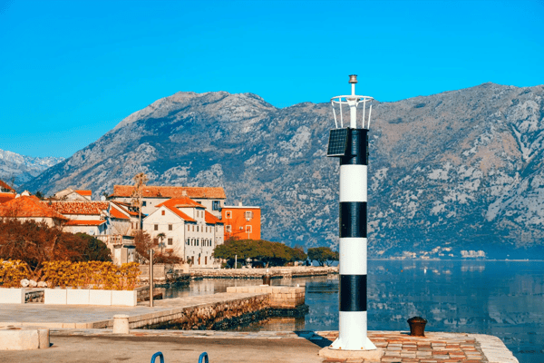 black and white lighthouse in the sea prcanj kotor bay montenegro