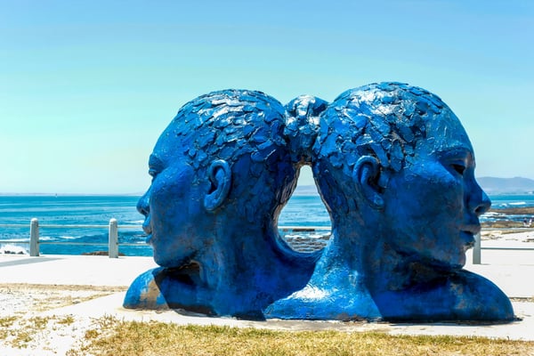blue heads statue in cape town art of south africa sea point promenade