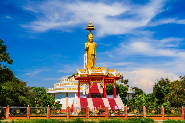 buddha asia of thai tample with blue sky in thailand