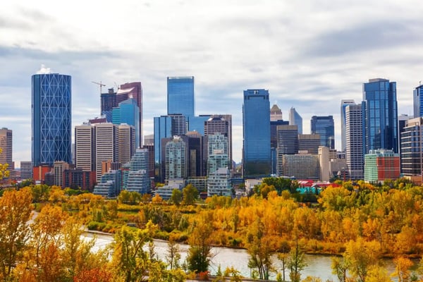 calgary downtown skyline during fall or autumn colors with bow river surrounding the financial 