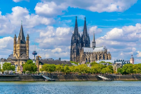 cityscape of cologne with hohenzollern bridge cathedral and saint martin church germany