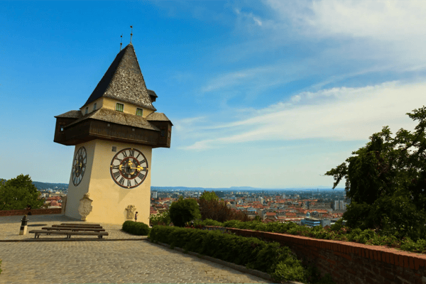 clock tower called the uhrturm on top of schlossberg castle hill in graz summer in austria europe 