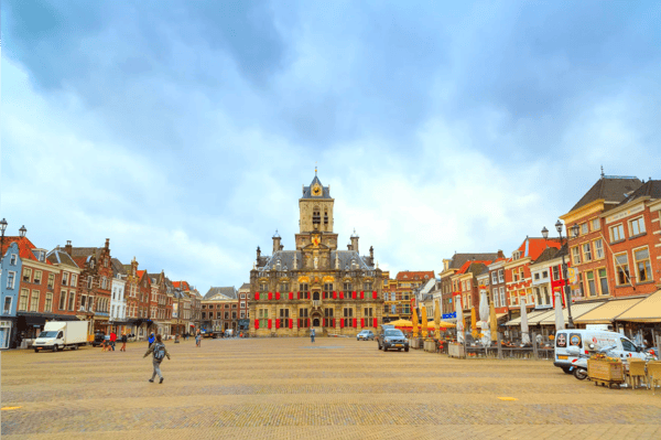 delft netherlands stadhuis or city hall markt square panorama with houses people 