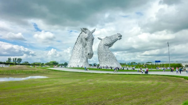 falkirk scotland thunder clouds moving above the kelpies statue by andy scot helix park 