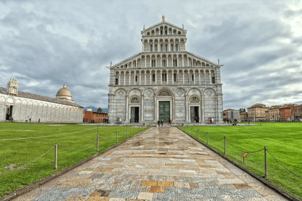 famous piazza dei miracoli in pisa with dome and leaning tower close up detail view
