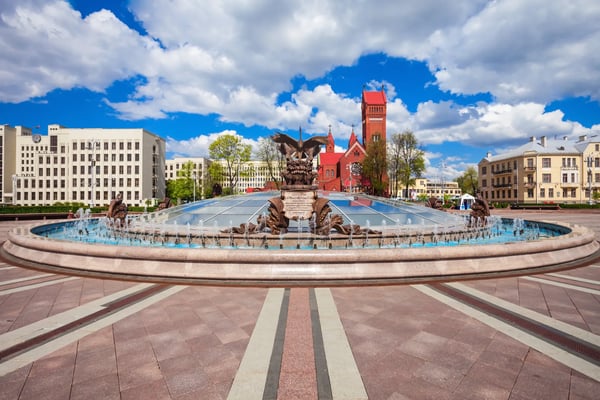 fountain and church of saints simon and helena on the independence square in minsk belaru