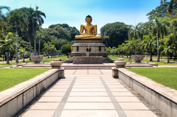 golden buddha statue in the viharamahadevi park in the center of colombo the capital of srilanka