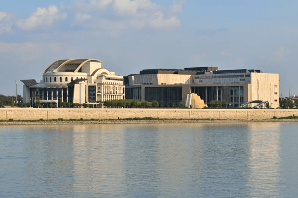 hungarian national theater and palace of arts at budapest from opposite side of danube