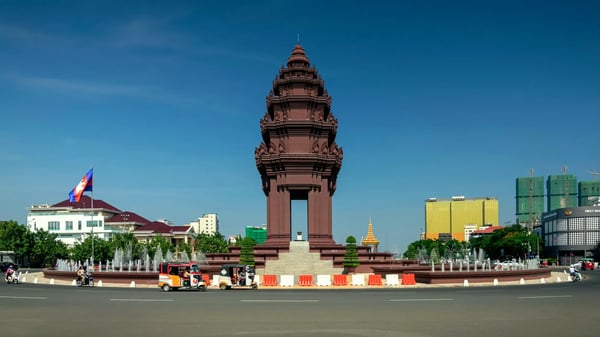 independence monument landmark on central downtown phnom penh city street in cambodia