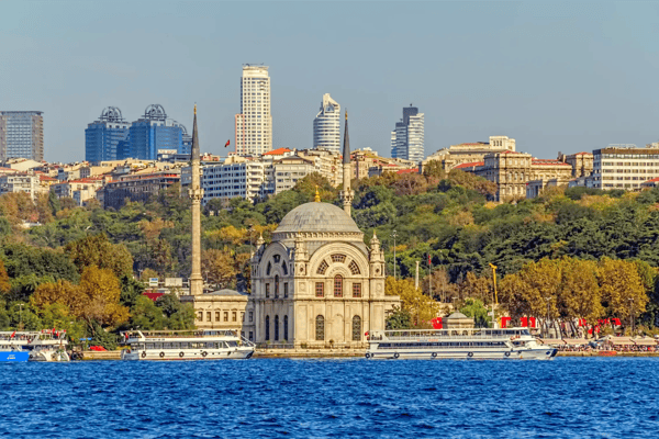 istanbul turkey tourist ships crusing around dolmabahce mosque