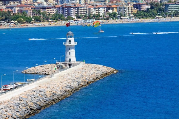 lighthouse in port of the city of alania turkey