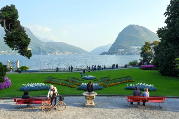 lugano switzerland people walking and taking pictures at the botanical garden