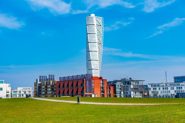 malmo swede torso skyscraper viewed behind marina in malmo sweden