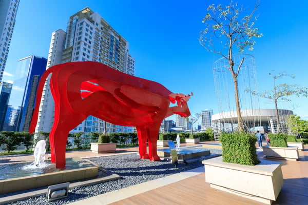 manila philippines red carabao sculpture at sm aura premier shopping mall in taguig