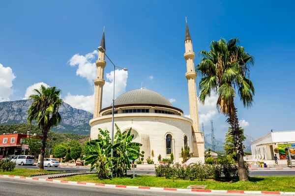 mosque in kemer on the backdrop of the mountains