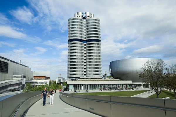 munich germany people walking on the bridge connecting the bmw museum with the bmw 