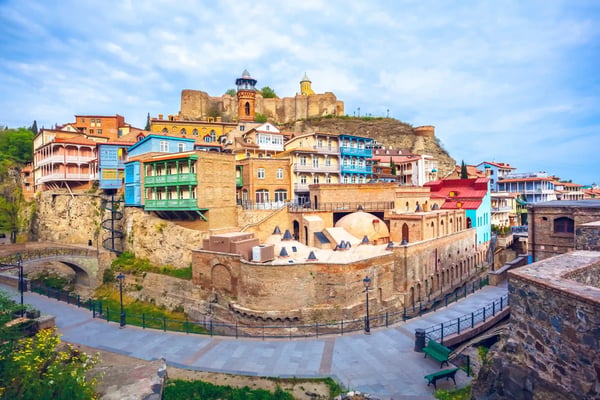 old sulfur baths in abanotubani district with wooden carved balconies in the old town of tbilisi georgia