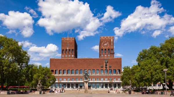 oslo norway the city hall square with sculptures fountains and the city hall radhus