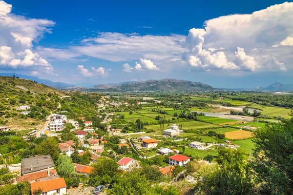 outskirts of town with mountain range on background europe