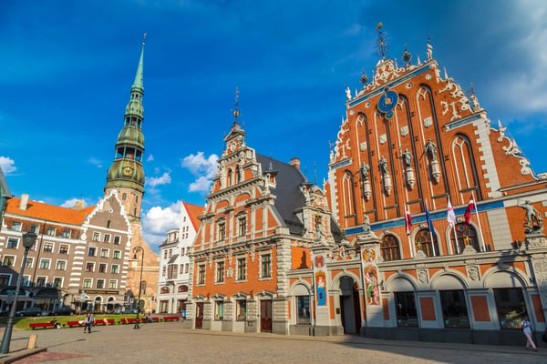 riga latvia house of the blackheads and saint peters church in riga in a beautiful