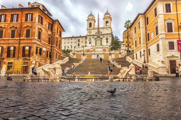 rome italy fontana della barcaccia or fountain of the longboat in the cloudy morning