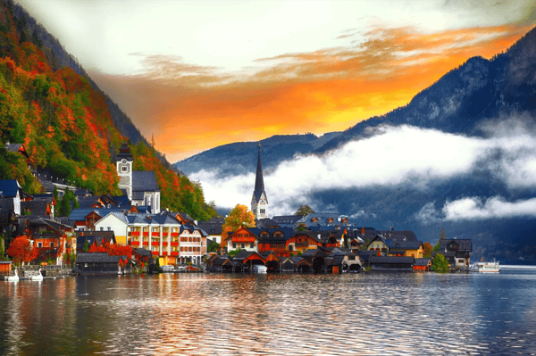 scenic view of famous hallstatt mountain village with hallstatter lake foggy autumn sunrise austria 