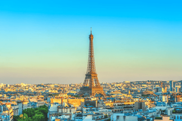 skyline of paris with eiffel tower at dusk