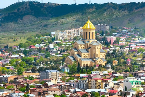 tbilisi skyline aerial drone view from above kura river and old town of tbilisi cityscape georgia
