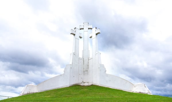 three crosses in vilnius lithuania on a hill against stormy and dramatic clouds