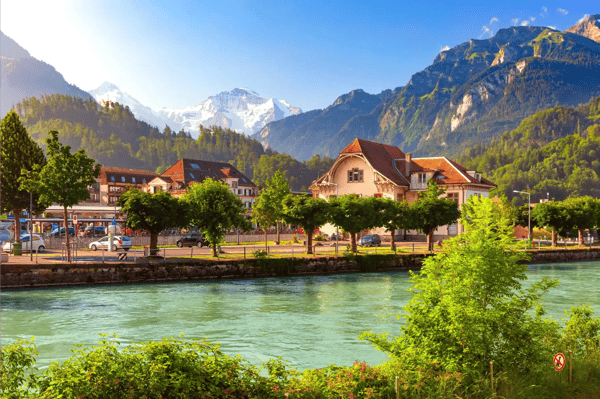 train station and aare river in interlaken important tourist center in bernese highlands switzerland