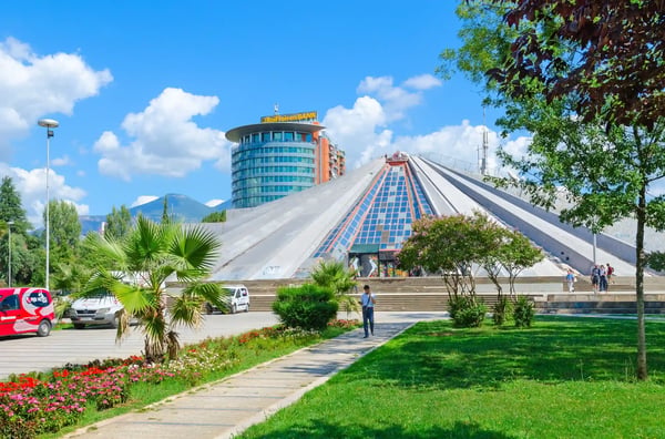 unknown people are near building pyramid former museum of communist