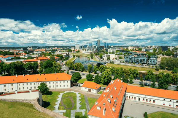 vilnius lithuania modern city and part of old town under dramatic sky