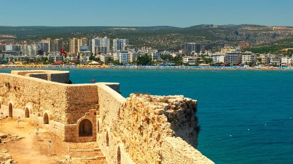 walls of maiden s castle or kizkalesi or deniz kalesi and view of sea and kizkalesi town mersin turkey