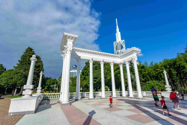 white elegant colonnades in the entrance of batumi boulevard 