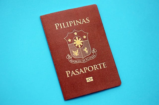 Philippines Passport On A Blue Background