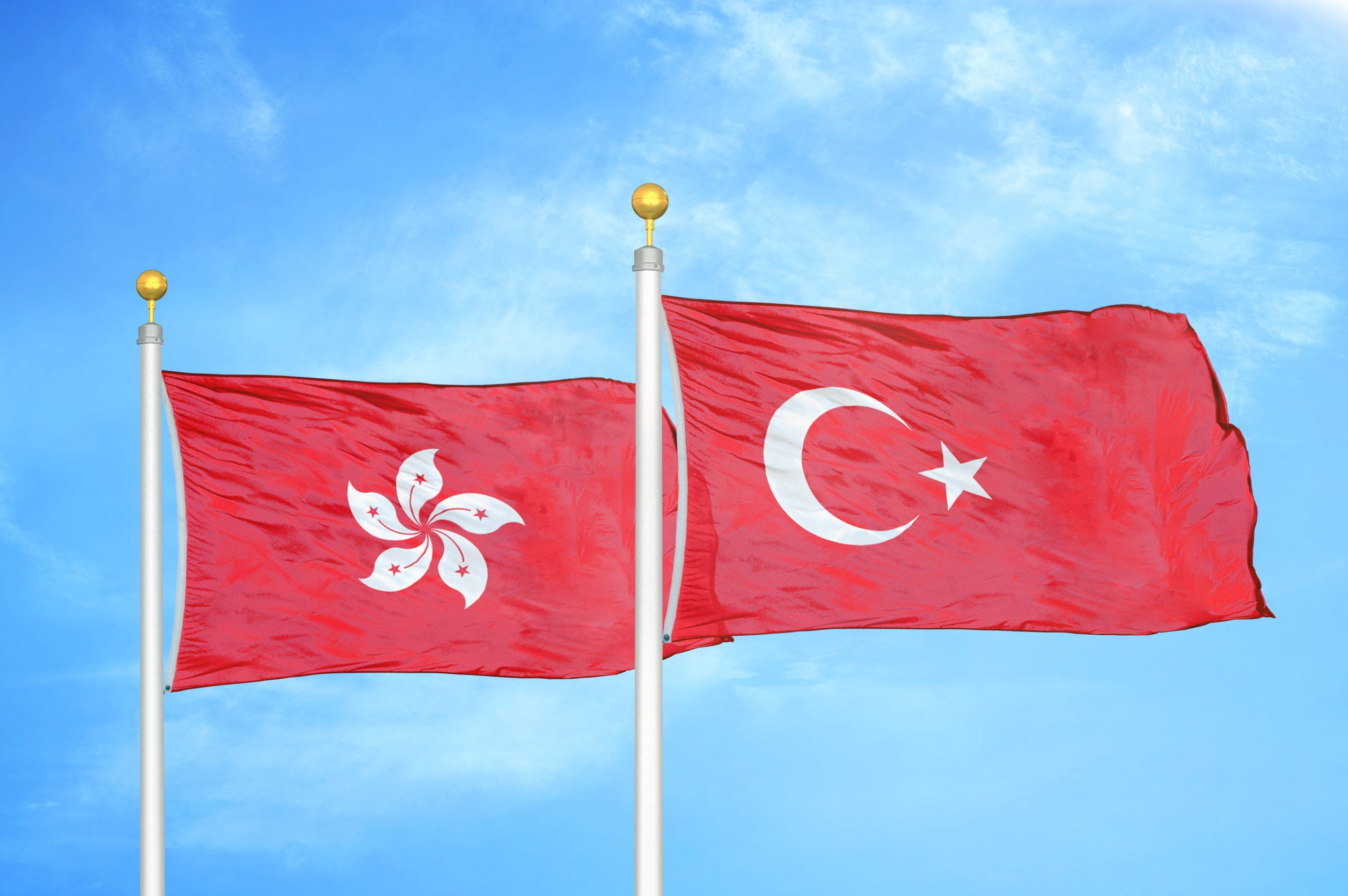 Hong Kong and Turkey flags flying Hong Kong and Turkey flags flying