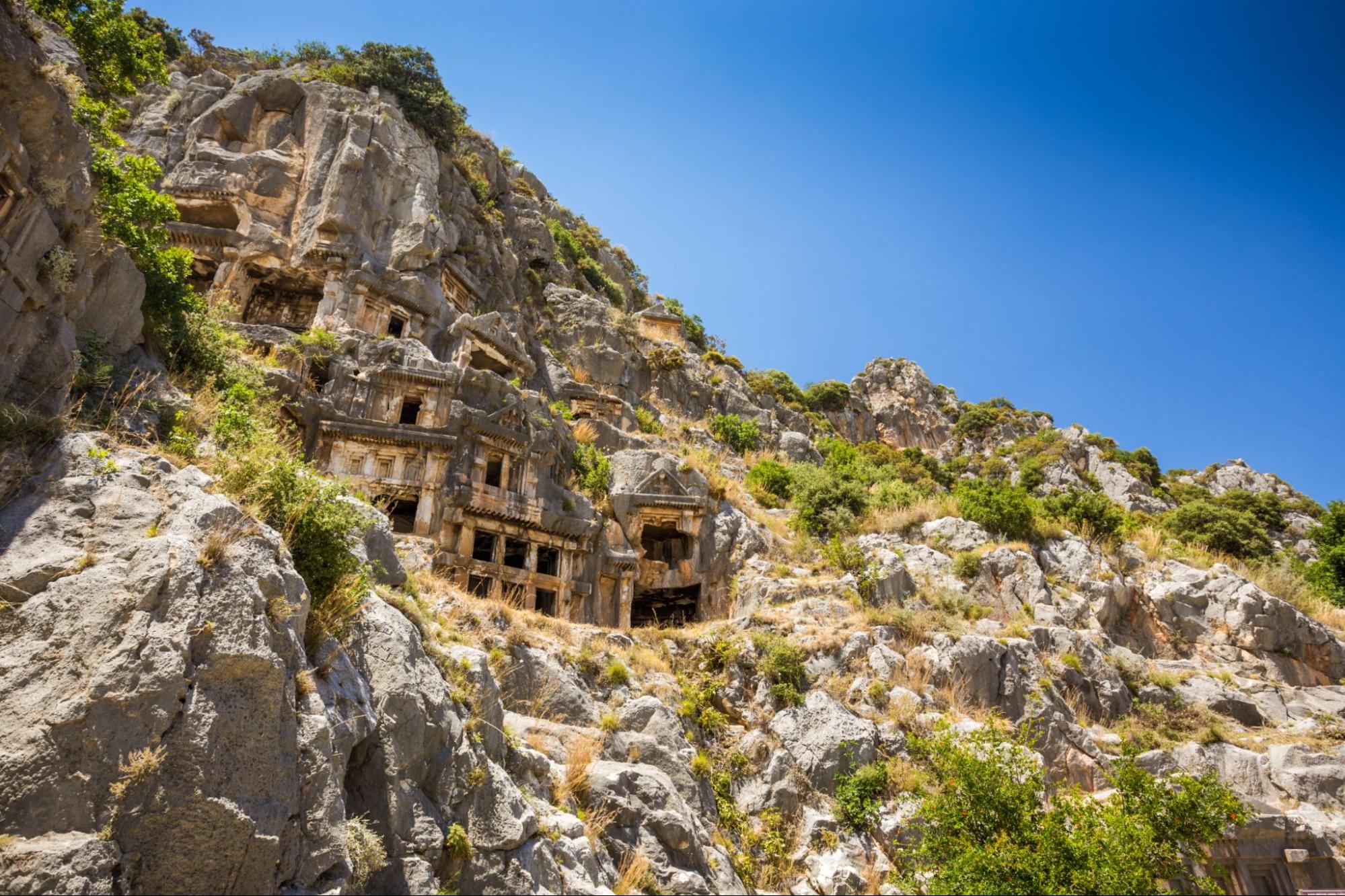 Ancient lycian Myra rock tomb ruins at Turkey Demre