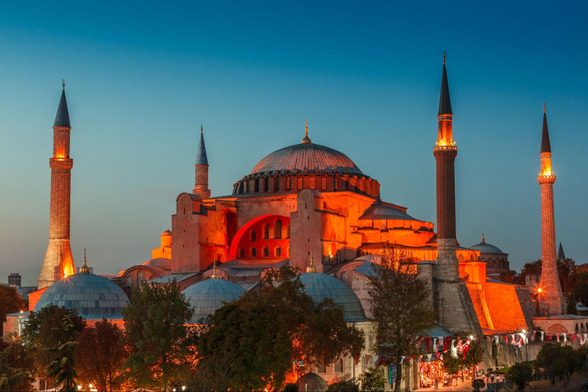Hagia Sophia with lantern light on blue sky background at night